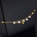 [Clover Jewelry]LOGO 6 MOTIV STERNE UND SONNE GOLDENES ARMBAND
