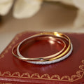 [Clover Jewelry]TRINITY TRICOLORED GOLD THREE-RING BRACELET