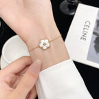 [Clover Schmuck]GLÜCKLICH WEISSE PERLMUTT PFLAUMENBLÜTE ARMBAND