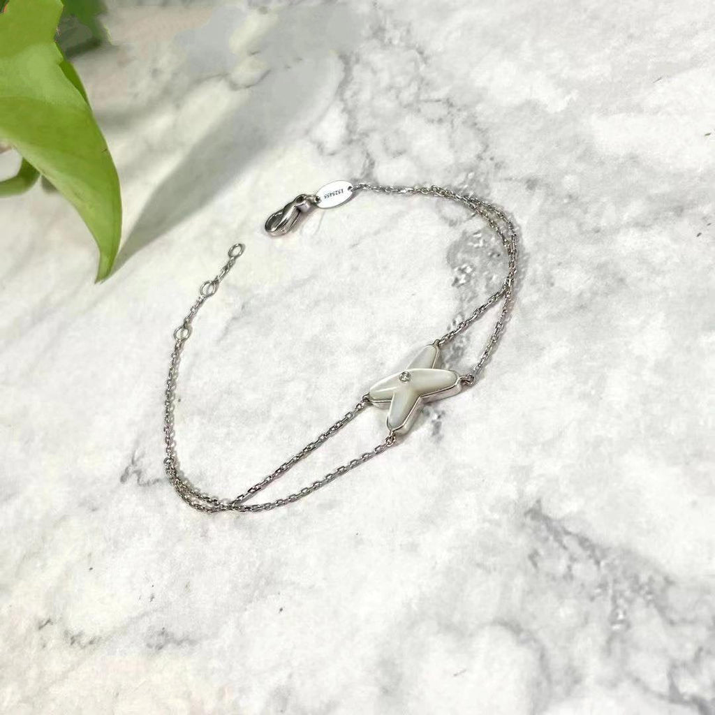 [Clover Jewelry]JEUX ARMBAND WEISS PERLMUTT SILBER 1 DIAMANT